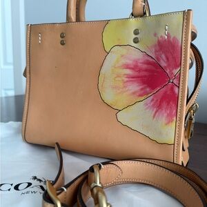 Coach X KOKI Rogue 25 Natural Leather and Pansy Design. Beautiful Brass Accents